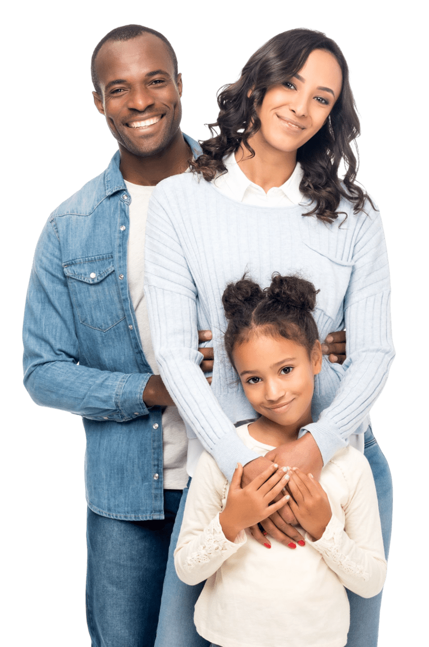 Smiling family posing together against black background.